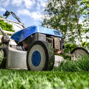 Regular Lawnmower Maintenance - Osburn Home Services - Paint Covered Overalls - Durham North Carolina