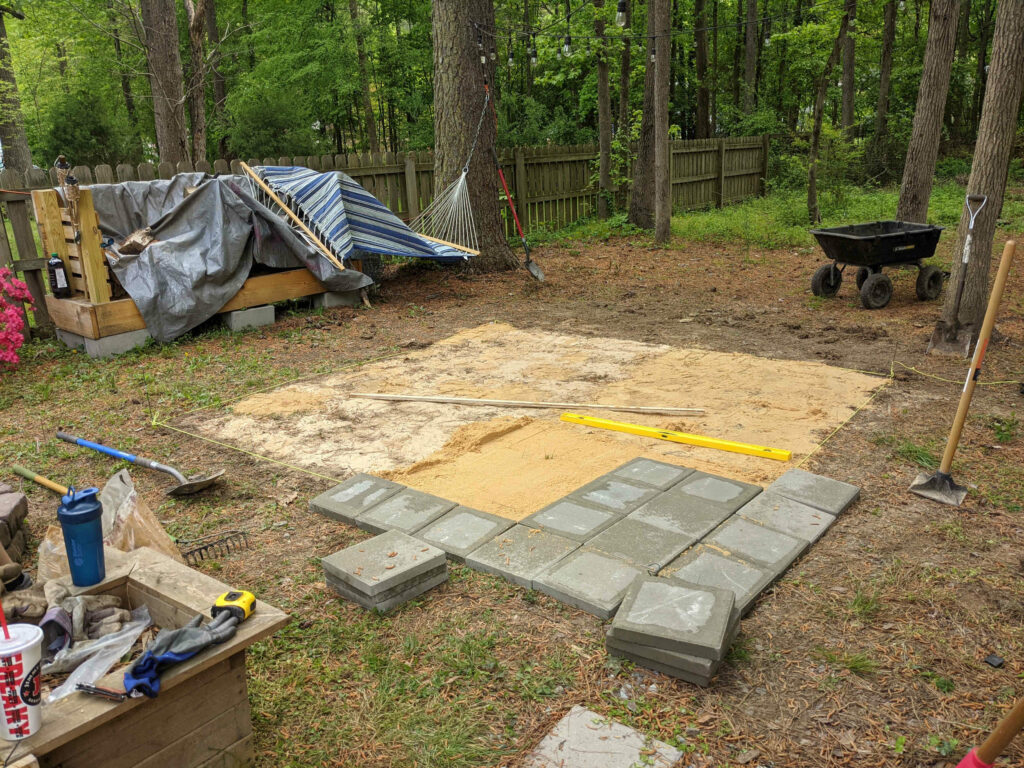 Laying Pavers on Smoothed Sand - Paint Covered Overalls - Durham NC
