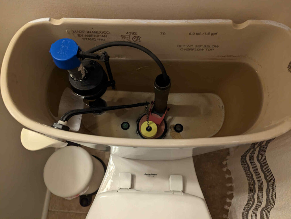 Fix a Running Toilet - Paint Covered Overalls - Durham NC